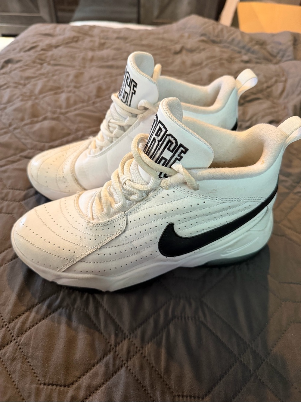 Nike Kids White Sneakers with Black Swoosh Accent